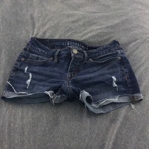Blue distressed denim shorts